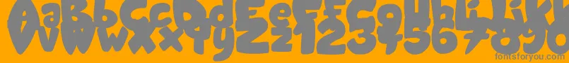 Fonte CandyShopBlack – fontes cinzas em um fundo laranja