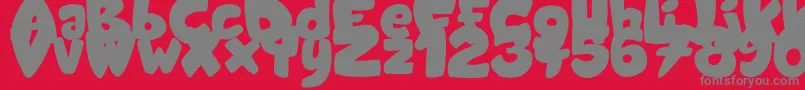 Fonte CandyShopBlack – fontes cinzas em um fundo vermelho