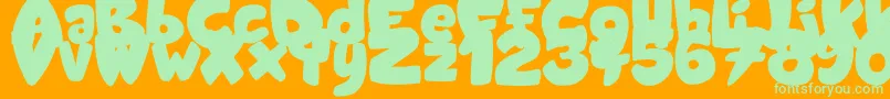 CandyShopBlack-Schriftart – Grüne Schriften auf orangefarbenem Hintergrund