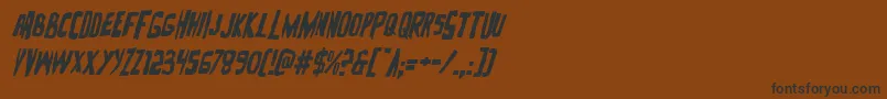 フォントZakensteinital – 黒い文字が茶色の背景にあります