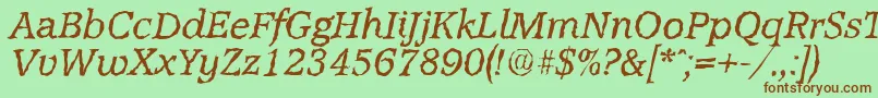 Fonte AccoladerandomItalic – fontes marrons em um fundo verde