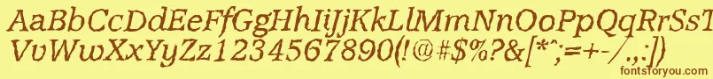 AccoladerandomItalic-Schriftart – Braune Schriften auf gelbem Hintergrund