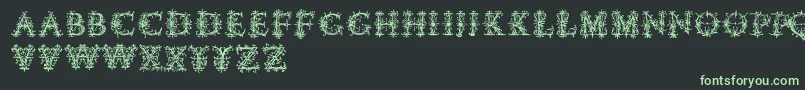 Vespasiansflorials-fontti – vihreät fontit mustalla taustalla
