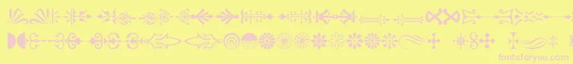 Decorations-fontti – vaaleanpunaiset fontit keltaisella taustalla