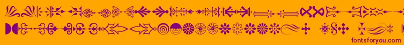 Czcionka Decorations – fioletowe czcionki na pomarańczowym tle