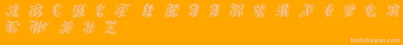 フォントVictorianinitials1 – オレンジの背景にピンクのフォント