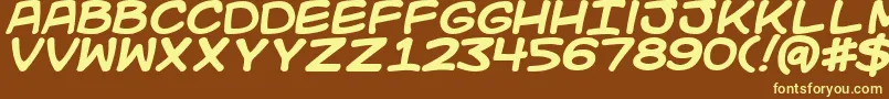 Kidkosmicb-Schriftart – Gelbe Schriften auf braunem Hintergrund