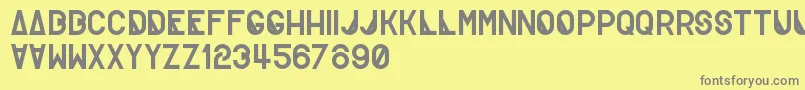 More about Creatif Font Creatif Font – Gray Fonts on Yellow Background