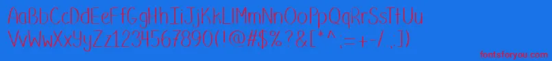 Putumayo Font – Red Fonts on Blue Background