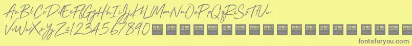 フォントStayRadDemo – 黄色の背景に灰色の文字