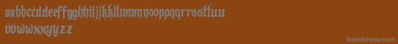 Шрифт Lazymonkdemo – серые шрифты на коричневом фоне