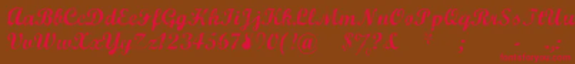 Czcionka MarcelleScript – czerwone czcionki na brązowym tle