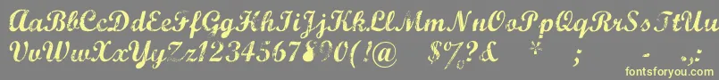 MarcelleScript Font – Yellow Fonts on Gray Background