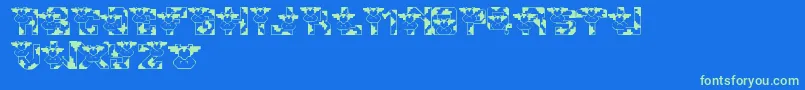 LmsConradsCows Font – Green Fonts on Blue Background