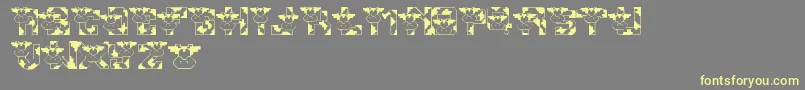 LmsConradsCows Font – Yellow Fonts on Gray Background