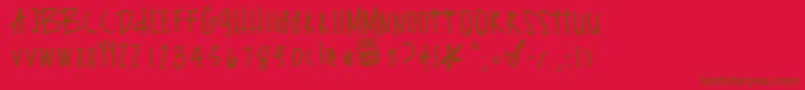 Шрифт Surprzebirthday – коричневые шрифты на красном фоне