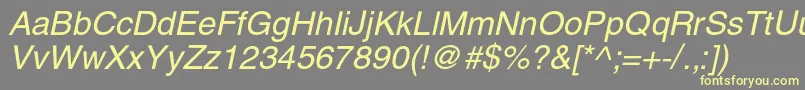 HelioscItalic-fontti – keltaiset fontit harmaalla taustalla
