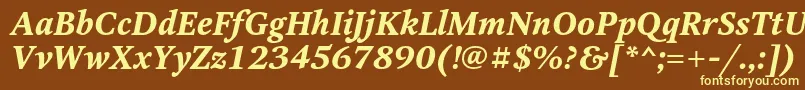 OctavaBoldItalic-fontti – keltaiset fontit ruskealla taustalla