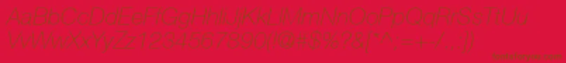 HelveticaNeueCe36ThinItalic-fontti – ruskeat fontit punaisella taustalla