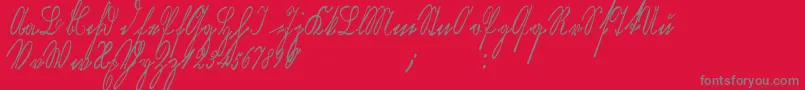 Kurrentkupferstichthin-Schriftart – Graue Schriften auf rotem Hintergrund