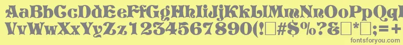 PretoriaRegular-fontti – harmaat kirjasimet keltaisella taustalla