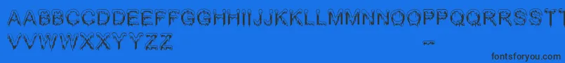 Czcionka JizzMassBc – czarne czcionki na niebieskim tle
