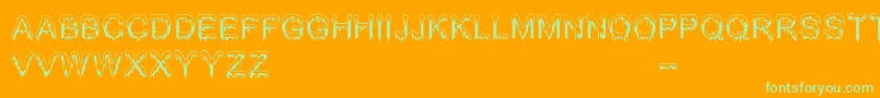 JizzMassBc-Schriftart – Grüne Schriften auf orangefarbenem Hintergrund