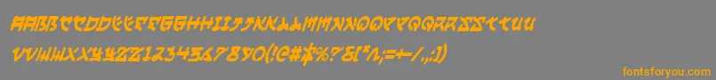 フォントYamaMotoCondensedItalic – オレンジの文字は灰色の背景にあります。