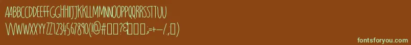 Magnitude-Schriftart – Grüne Schriften auf braunem Hintergrund