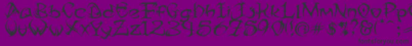 TribalTwo-fontti – mustat fontit violetilla taustalla