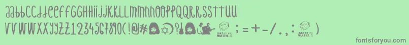 フォントCamaronDeLaIsla – 緑の背景に灰色の文字