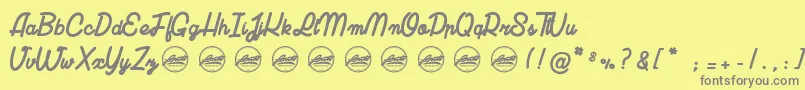LuciaPersonalUseOnly-fontti – harmaat kirjasimet keltaisella taustalla