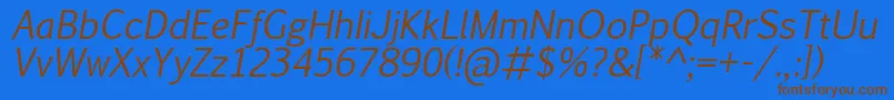 フォントPigiarniqItalic – 茶色の文字が青い背景にあります。