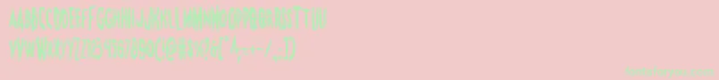Monsteramacond-Schriftart – Grüne Schriften auf rosa Hintergrund