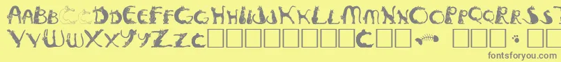 Pussyfoo-Schriftart – Graue Schriften auf gelbem Hintergrund