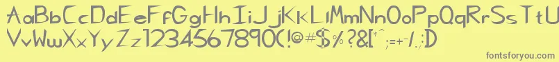 フォントRebeccaRegular – 黄色の背景に灰色の文字