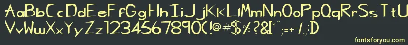 フォントRebeccaRegular – 黒い背景に黄色の文字
