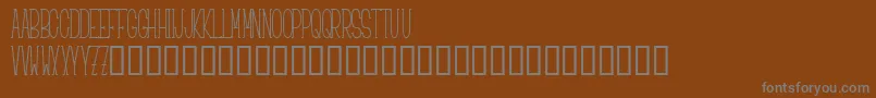 Шрифт Ciao – серые шрифты на коричневом фоне