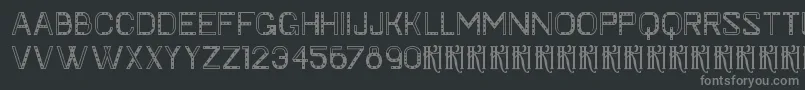 KhFaygt-fontti – harmaat kirjasimet mustalla taustalla