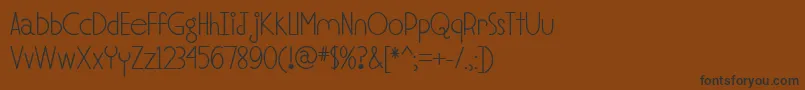 MfSoulMeetsBody Font – Black Fonts on Brown Background