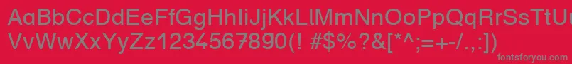 フォントDruckschriftDb – 赤い背景に灰色の文字