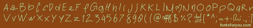 フォントToralfontclassic – 緑色の文字が茶色の背景にあります。