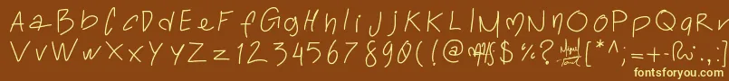 Toralfontclassic-fontti – keltaiset fontit ruskealla taustalla