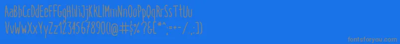 フォントItaloMedium – 青い背景に灰色の文字