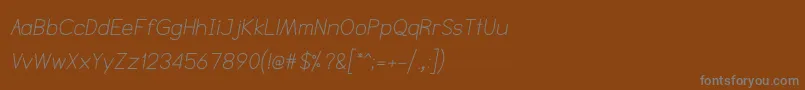NtsakkharaItalic Font – Gray Fonts on Brown Background
