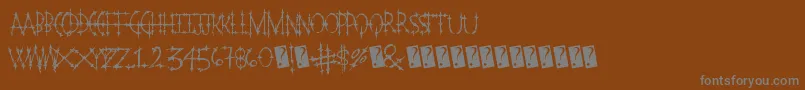 Pleasurecastlemarble Font – Gray Fonts on Brown Background