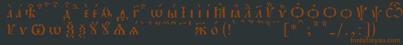 Шрифт PochaevskKucsSpacedout – коричневые шрифты на чёрном фоне