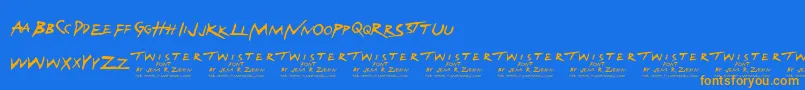 フォントTwister – オレンジ色の文字が青い背景にあります。