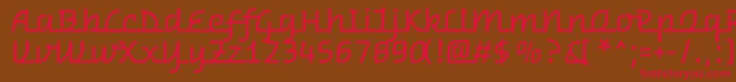 フォントWarnesRegular – 赤い文字が茶色の背景にあります。