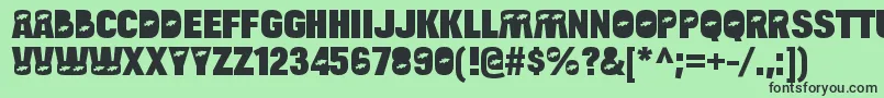 フォントBulltoadfishRegular – 緑の背景に黒い文字